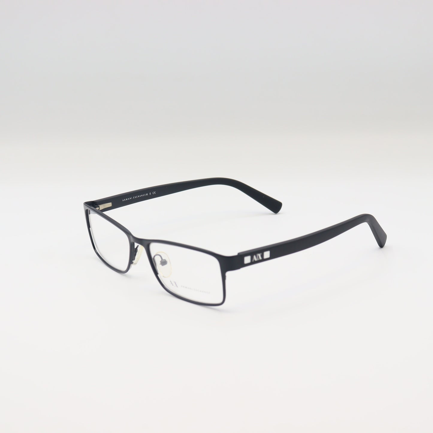 Black Armani Exchange rectangular eyeglasses with AX matte frame, stylish spectacles designed for a modern look.