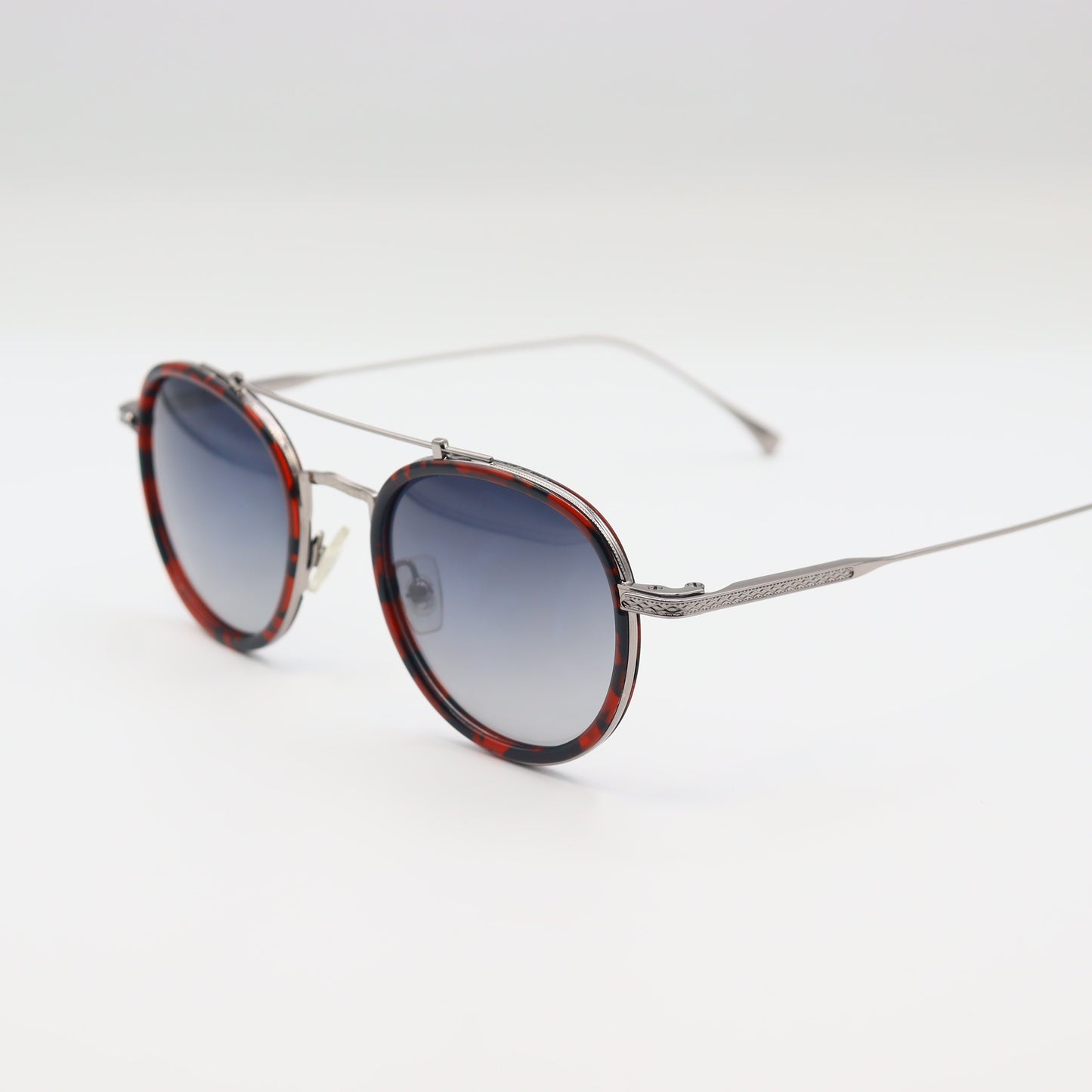 Vintage round sunglasses by CHASHMAY KHAS® with tortoise shell frames and gold accents, featuring polarized lenses.