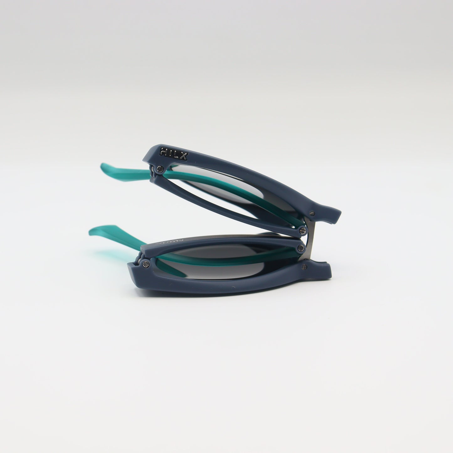 Off-White blue round sunglasses with matte navy and turquoise frames, featuring sleek design and tinted lenses.