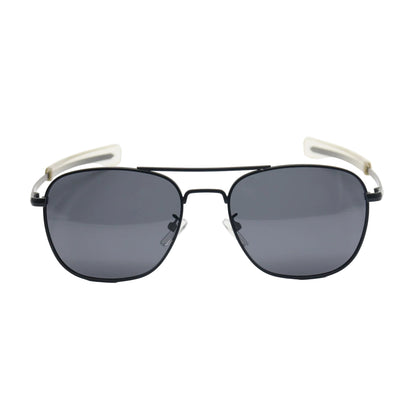Sunglasses with black frames and dark lenses on a white background