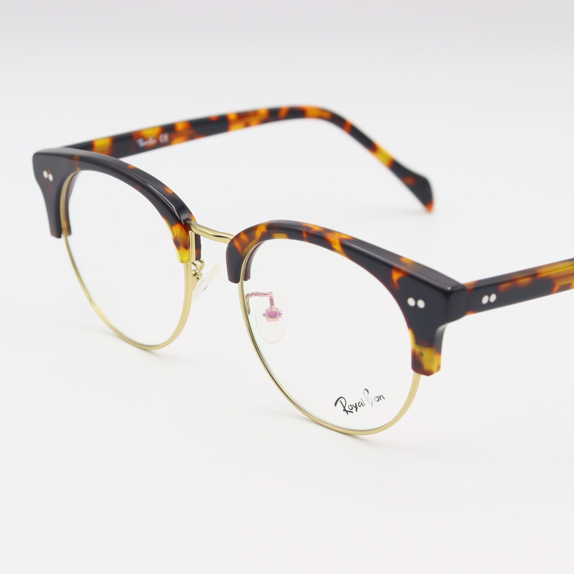 Round tortoiseshell eyeglasses by CHASHMAY KHAS® featuring classic spectacles design and clear lenses.