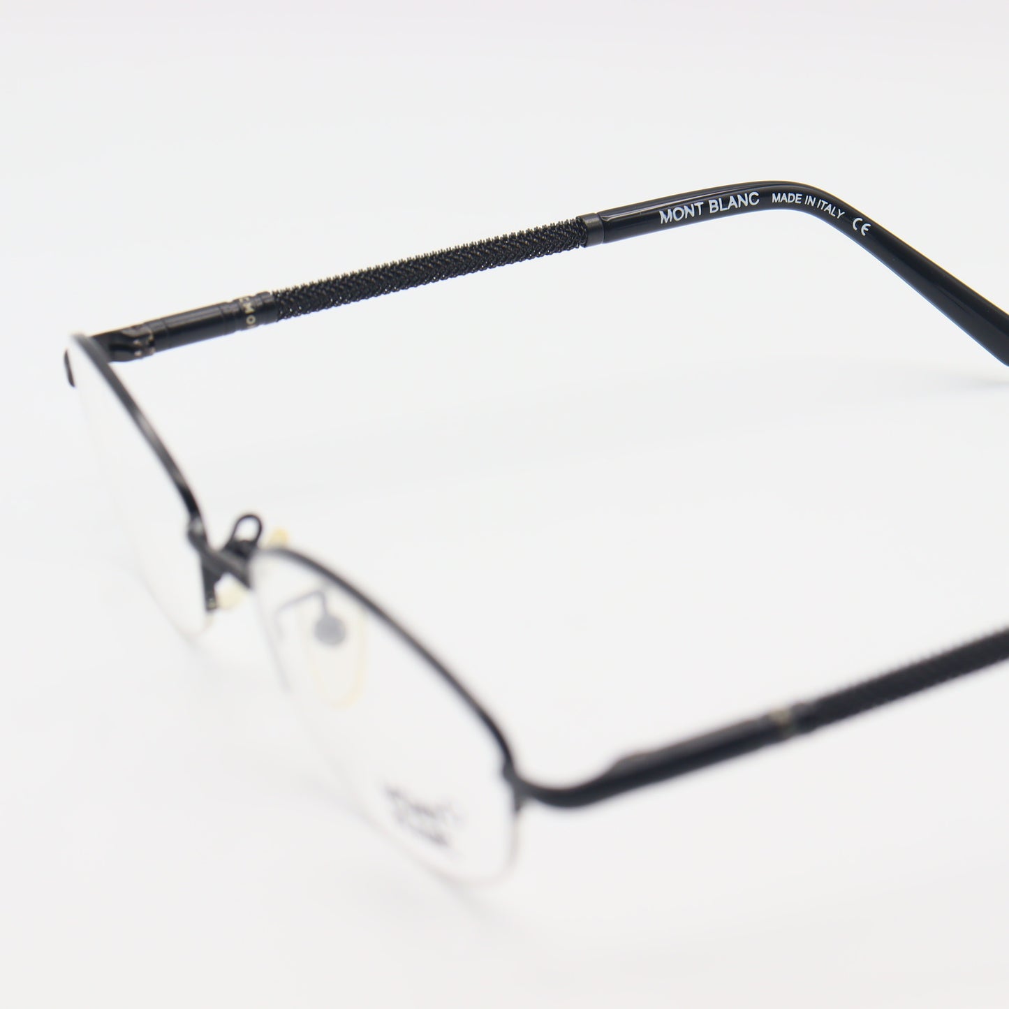Montblanc Oval Halfrim luxury unisex eyeglasses with sleek design, featuring black frames and clear lenses, by CHASHMAY KHAS®.