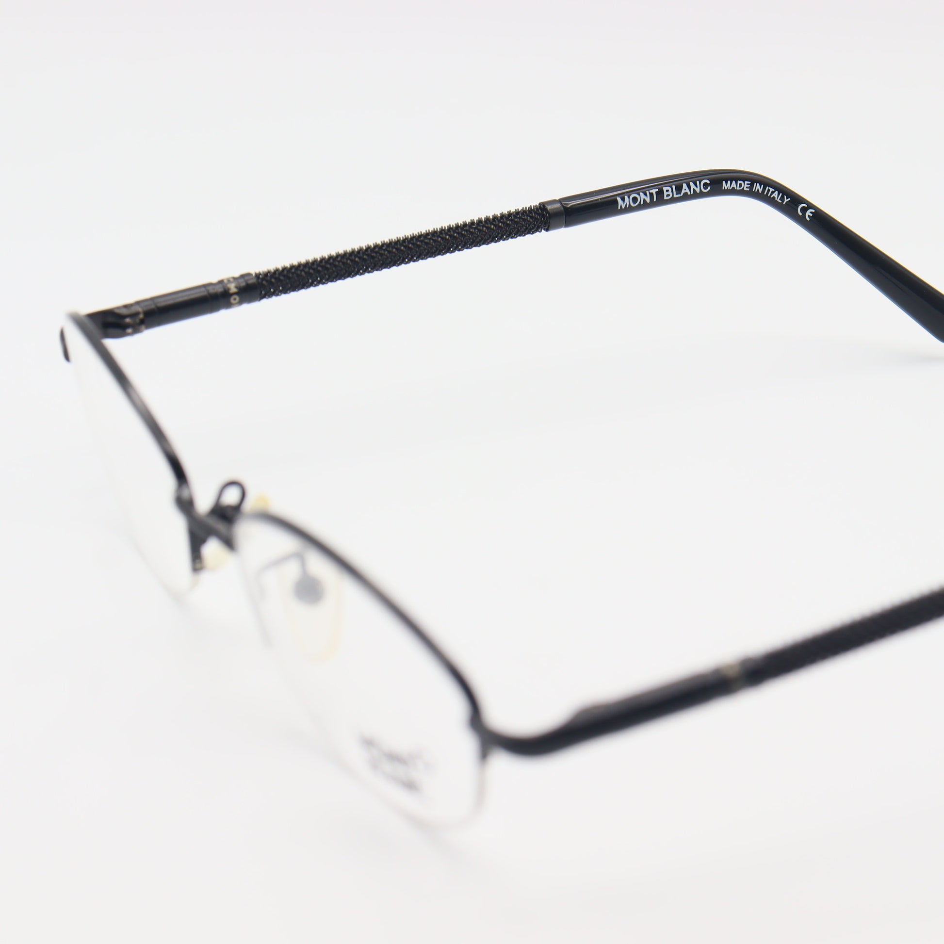 Montblanc Oval Halfrim luxury unisex eyeglasses with sleek design, featuring black frames and clear lenses, by CHASHMAY KHAS®.