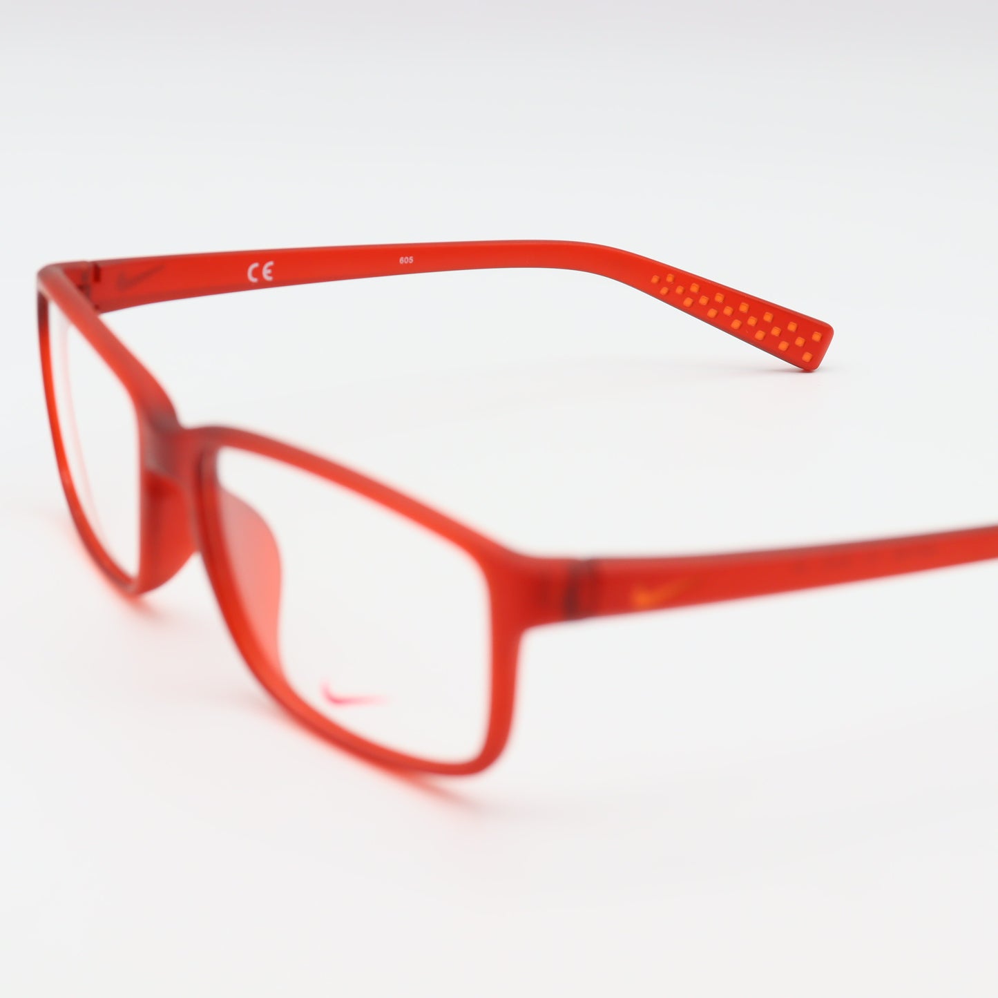 Red Nike Square lightweight sports eyeglasses from CHASHMAY KHAS® with a sleek, modern frame design.