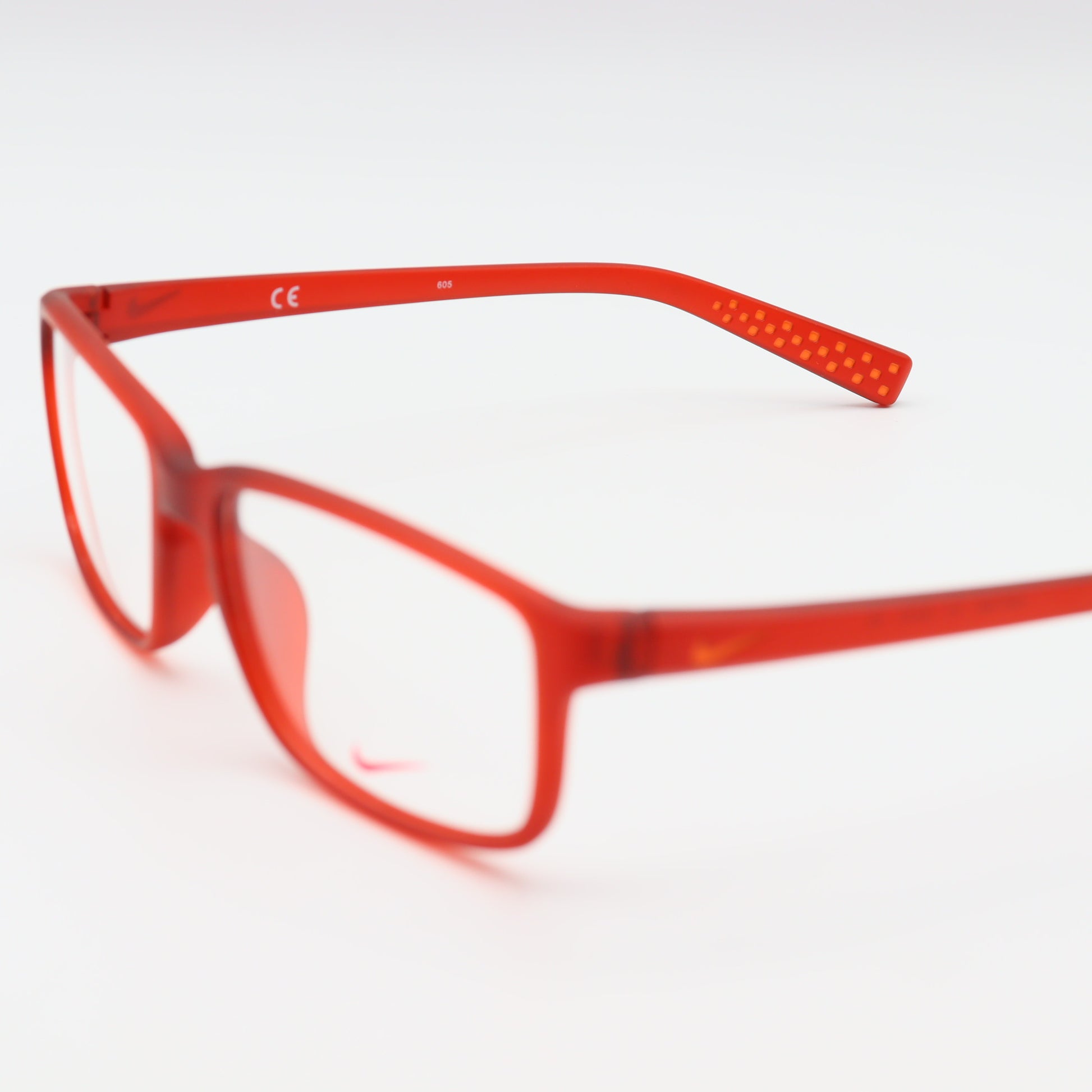 Red Nike Square lightweight sports eyeglasses from CHASHMAY KHAS® with a sleek, modern frame design.