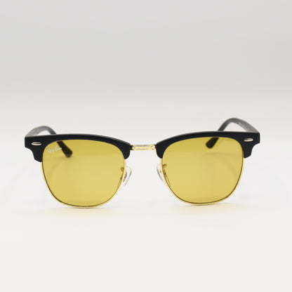 RayBan RB3016 Clubmaster sunglasses with black and tortoiseshell frame, metal accents, and dark lenses.