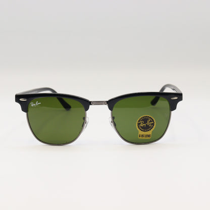 RayBan RB3016 Clubmaster sunglasses with black and gold frames, clear lenses, stylish design, and brand logo visible.
