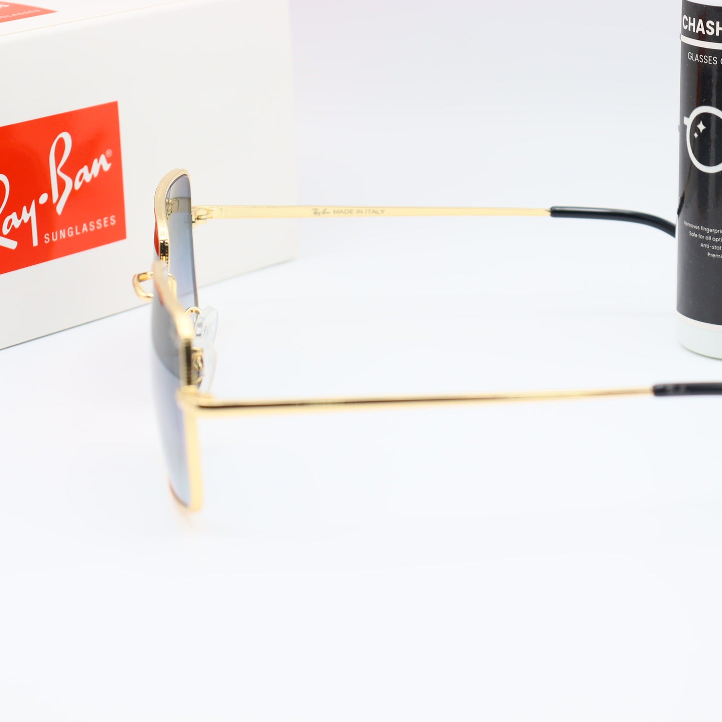 Chashmay Khas RayBan RB1971 premium gold rectangular sunglasses showing the sleek frame and tinted lenses.