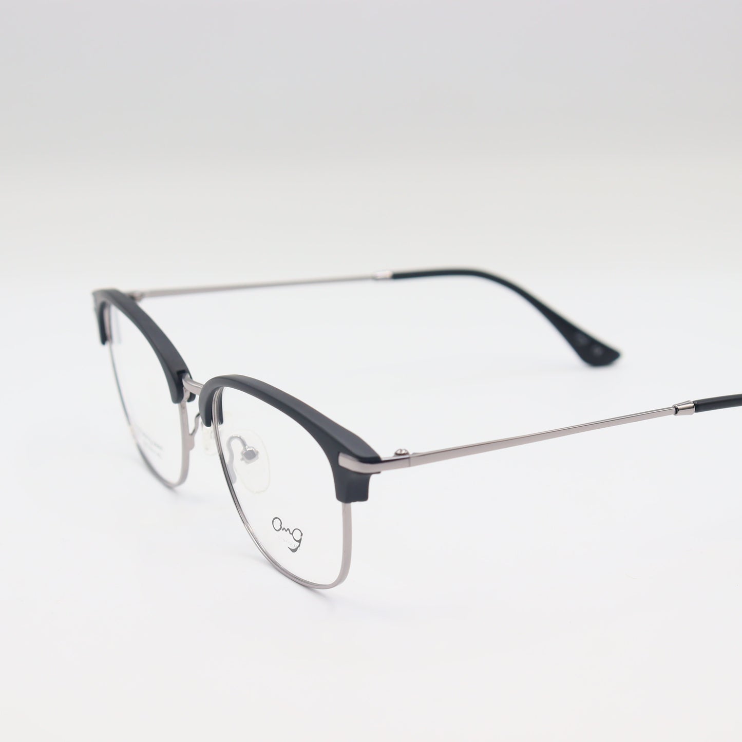 Black and silver oval spectacles by CHASHMAY KHAS® with clear lenses, stylish eyewear for seeing and being seen.