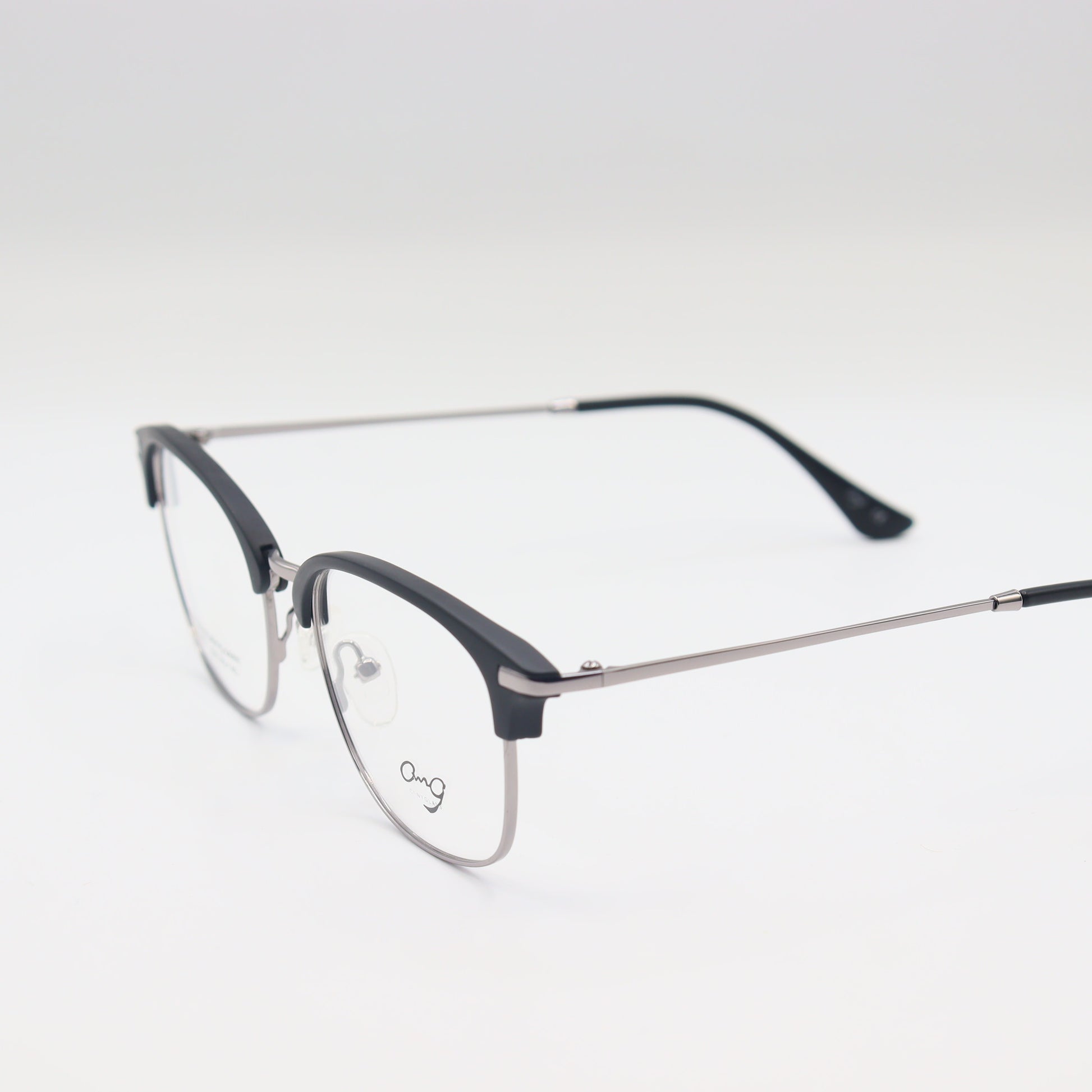 Black and silver oval spectacles by CHASHMAY KHAS® with clear lenses, stylish eyewear for seeing and being seen.