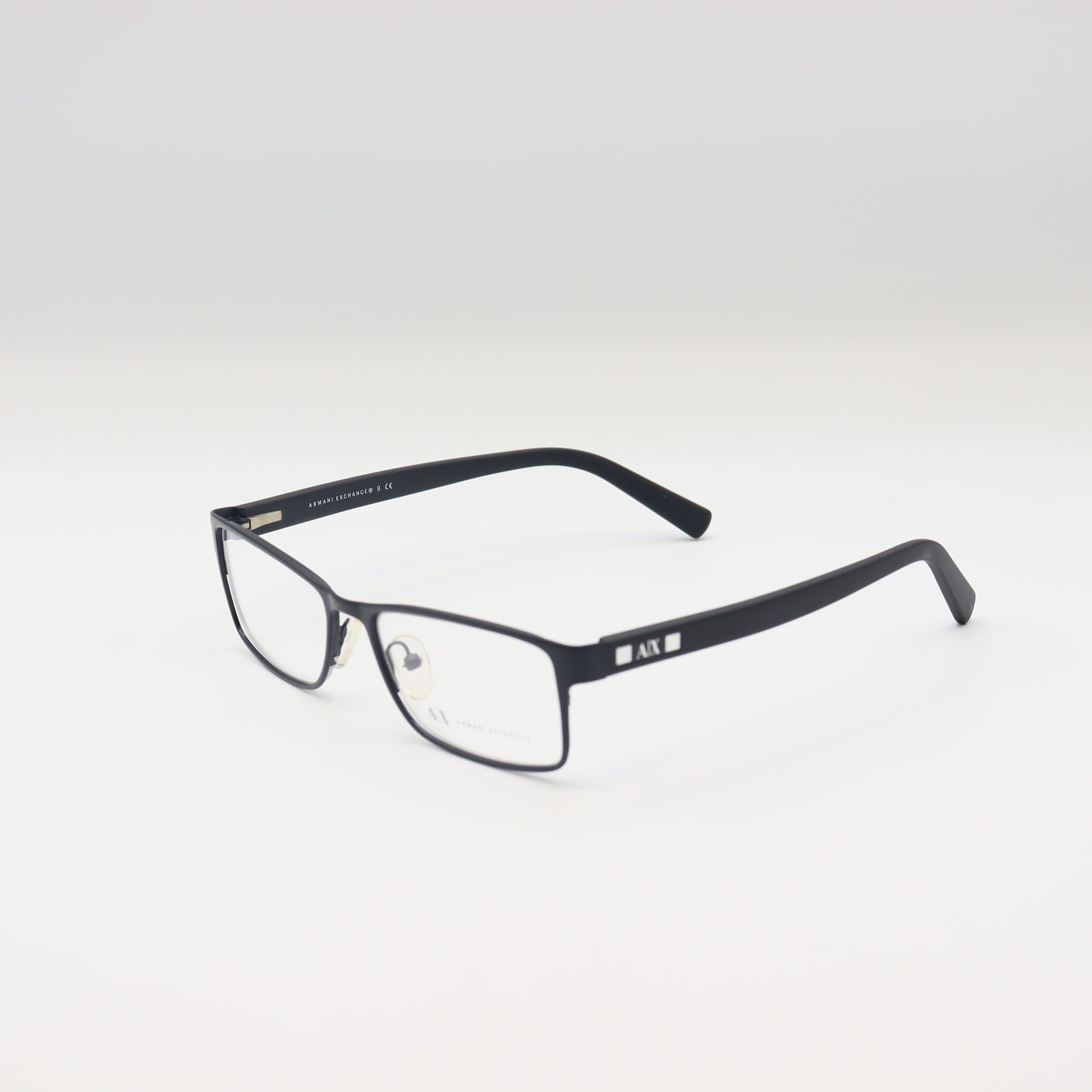 Black Armani Exchange rectangular eyeglasses with AX matte frame, stylish spectacles designed for a modern look.