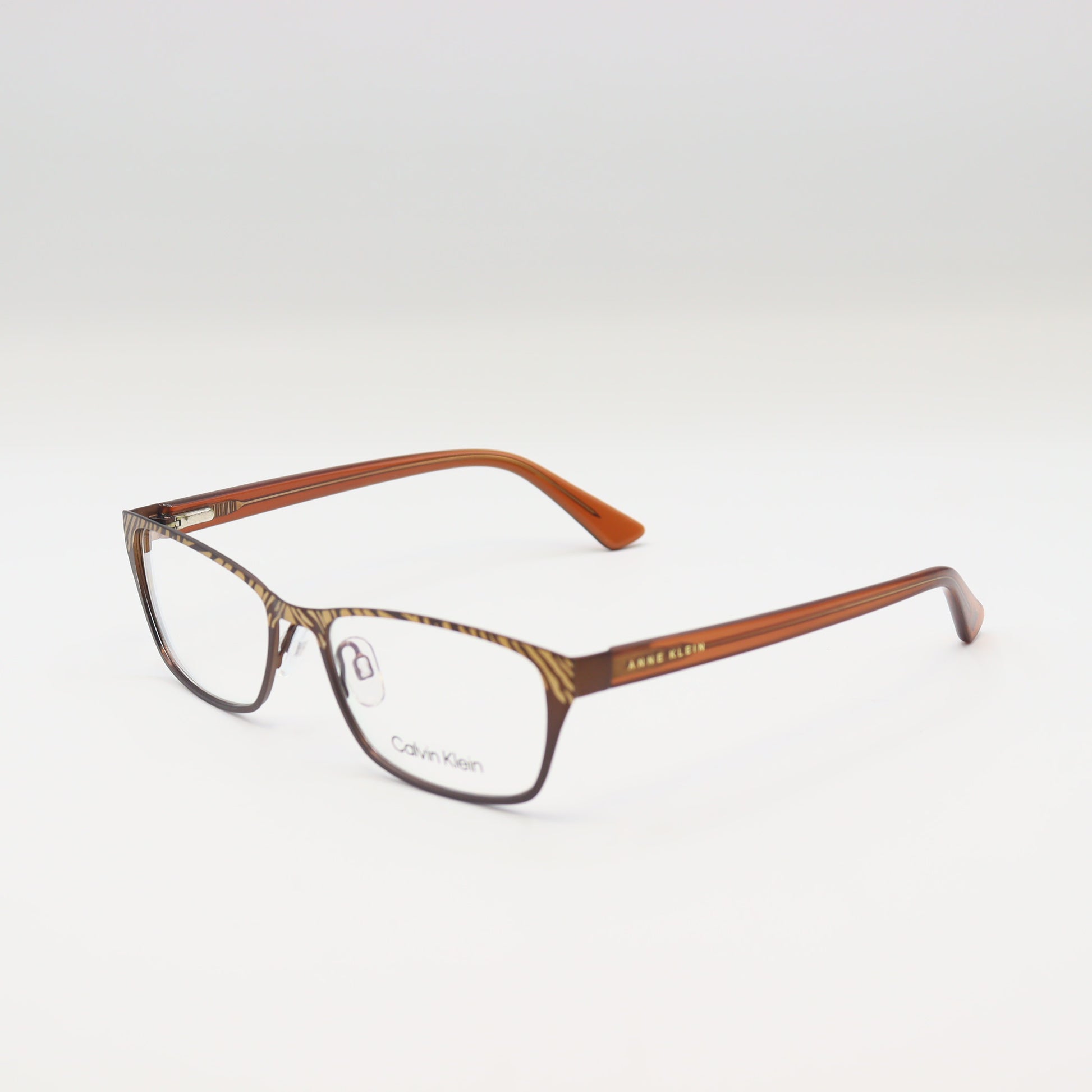 Calvin Klein zebra print rectangular spectacles in brown animal pattern with black accents, stylish eyeglasses by CHASHMAY KHAS®.