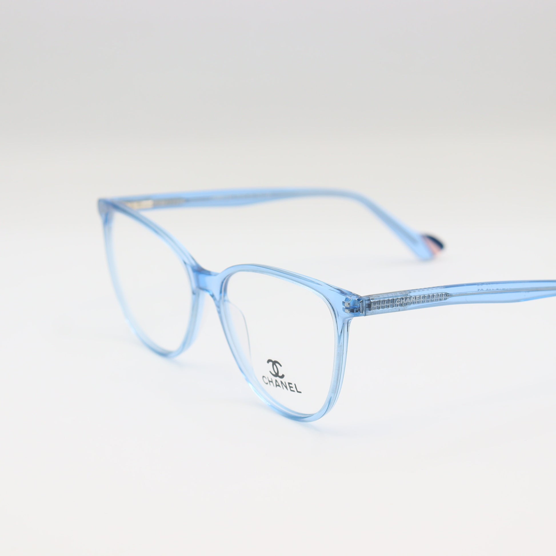 Chanel Light Blue Cat-Eye eyeglasses with transparent acetate frames from CHASHMAY KHAS® on a white background.