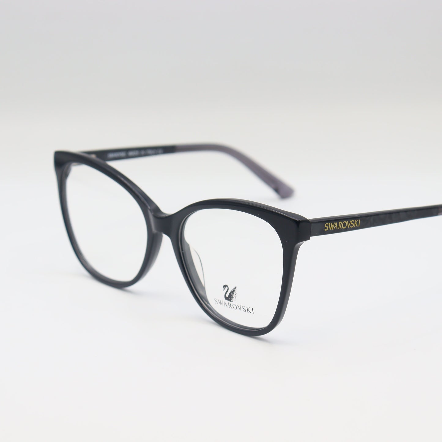 Swarovski black cat-eye eyeglasses by CHASHMAY KHAS® with elegant crystal accents, showcasing luxurious spectacle design.