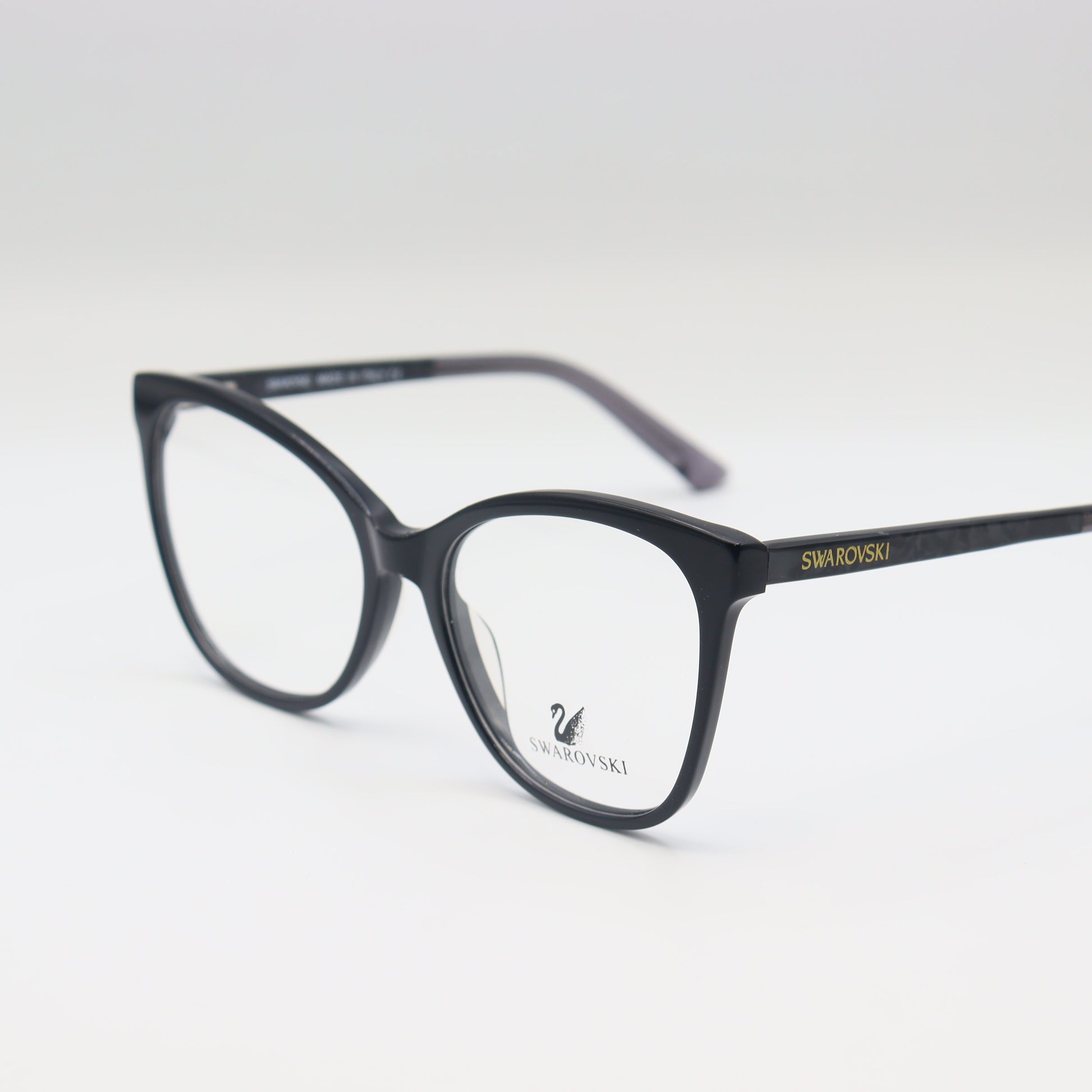 Swarovski black cat-eye eyeglasses by CHASHMAY KHAS® with elegant crystal accents, showcasing luxurious spectacle design.