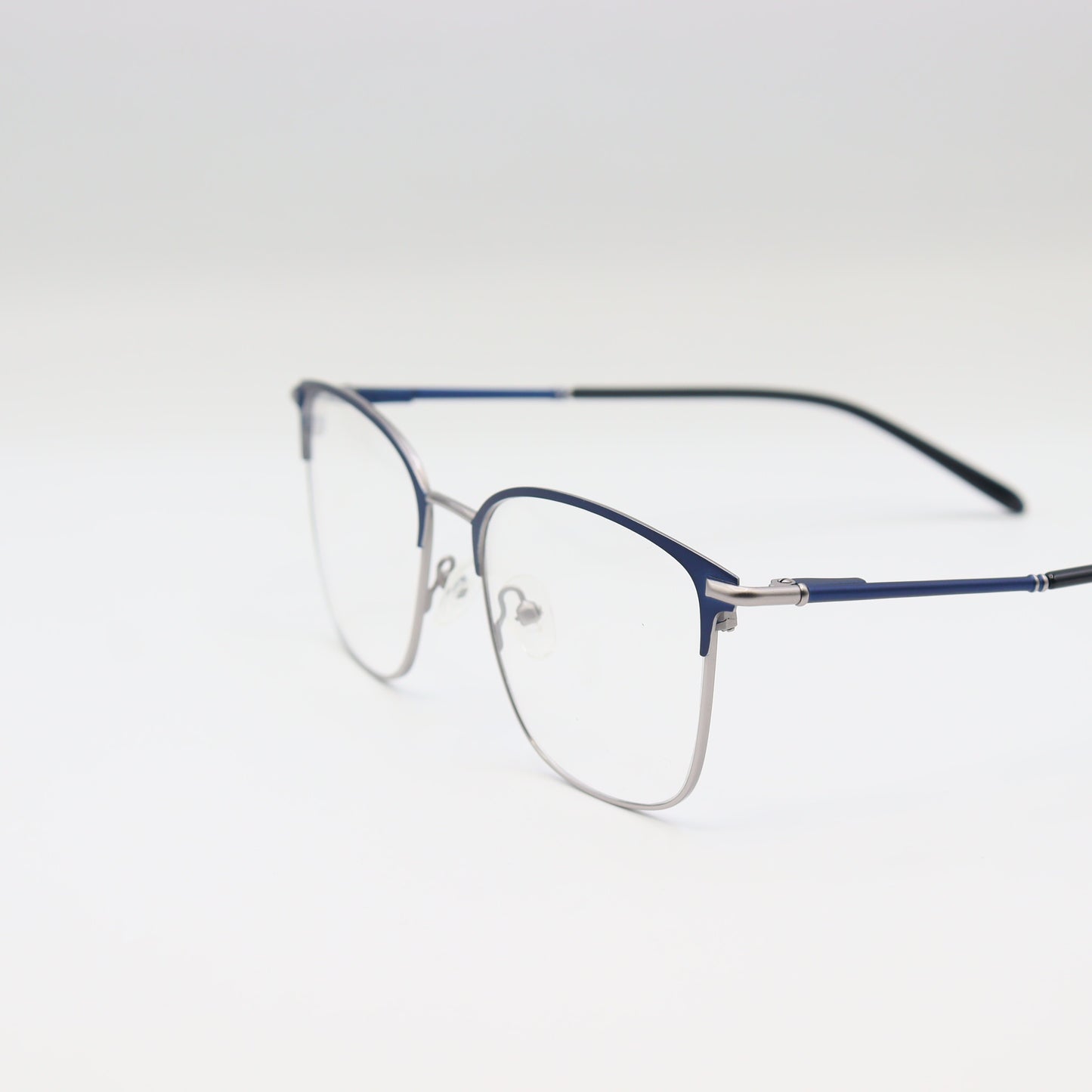 Navy blue and silver rectangular CHASHMAY KHAS® eyeglasses with two-tone design, showcasing sleek frames and stylish detail.