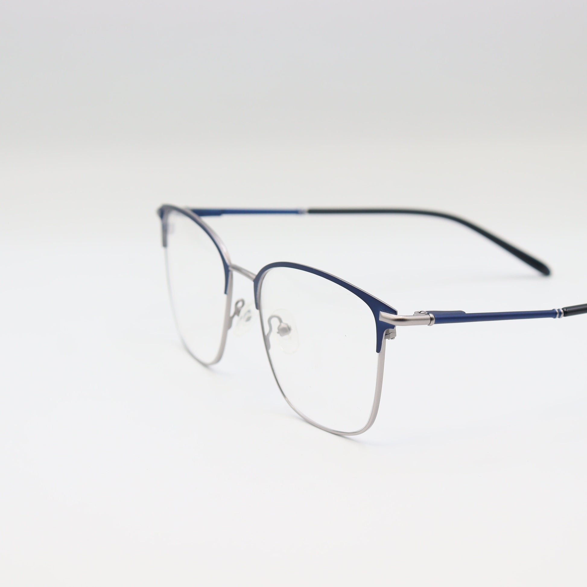 Navy blue and silver rectangular CHASHMAY KHAS® eyeglasses with two-tone design, showcasing sleek frames and stylish detail.