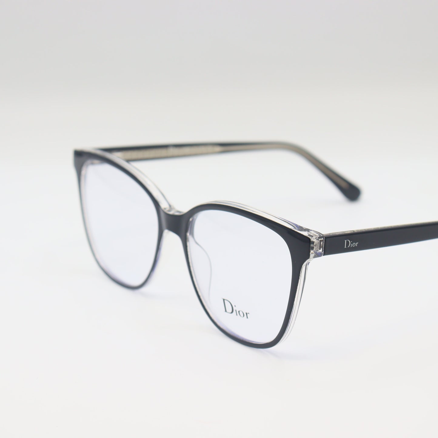 Dior black cat-eye eyeglasses with silver trim, luxury spectacles by CHASHMAY KHAS®, stylish and elegant eyewear.