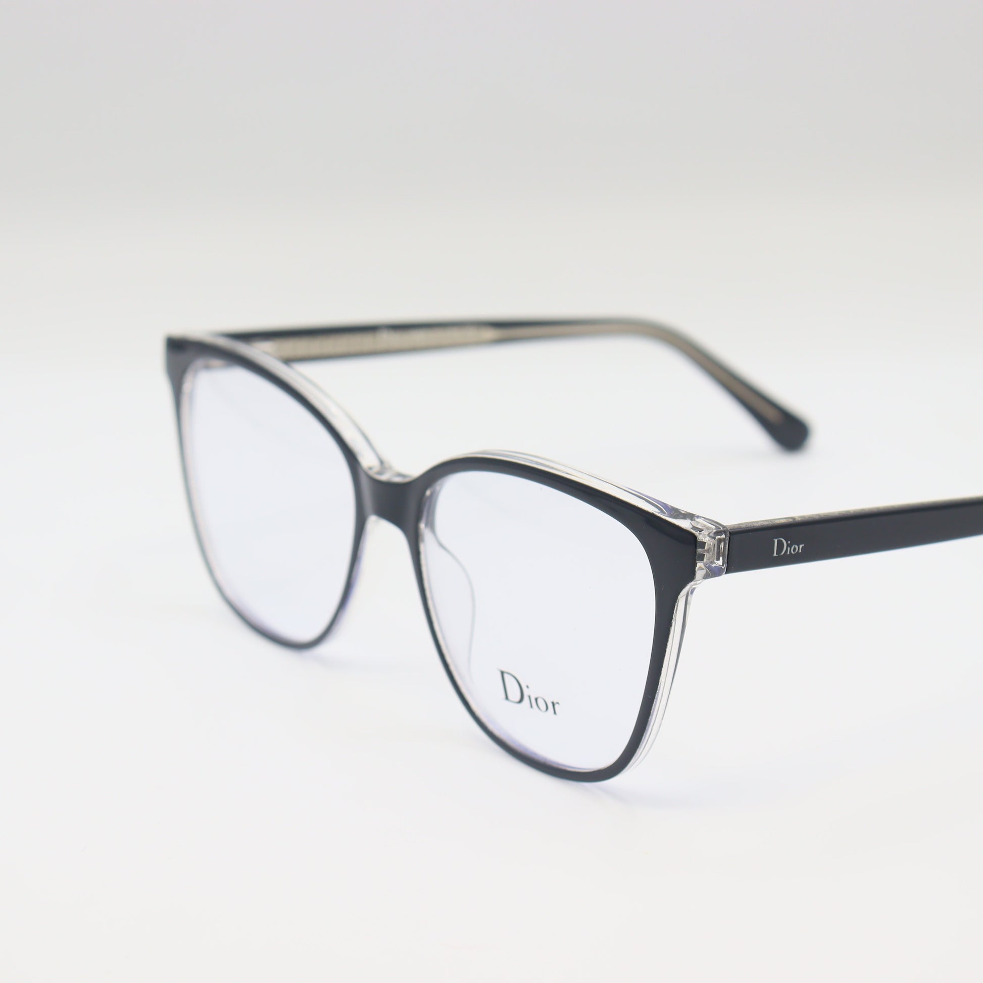 Dior black cat-eye eyeglasses with silver trim, luxury spectacles by CHASHMAY KHAS®, stylish and elegant eyewear.