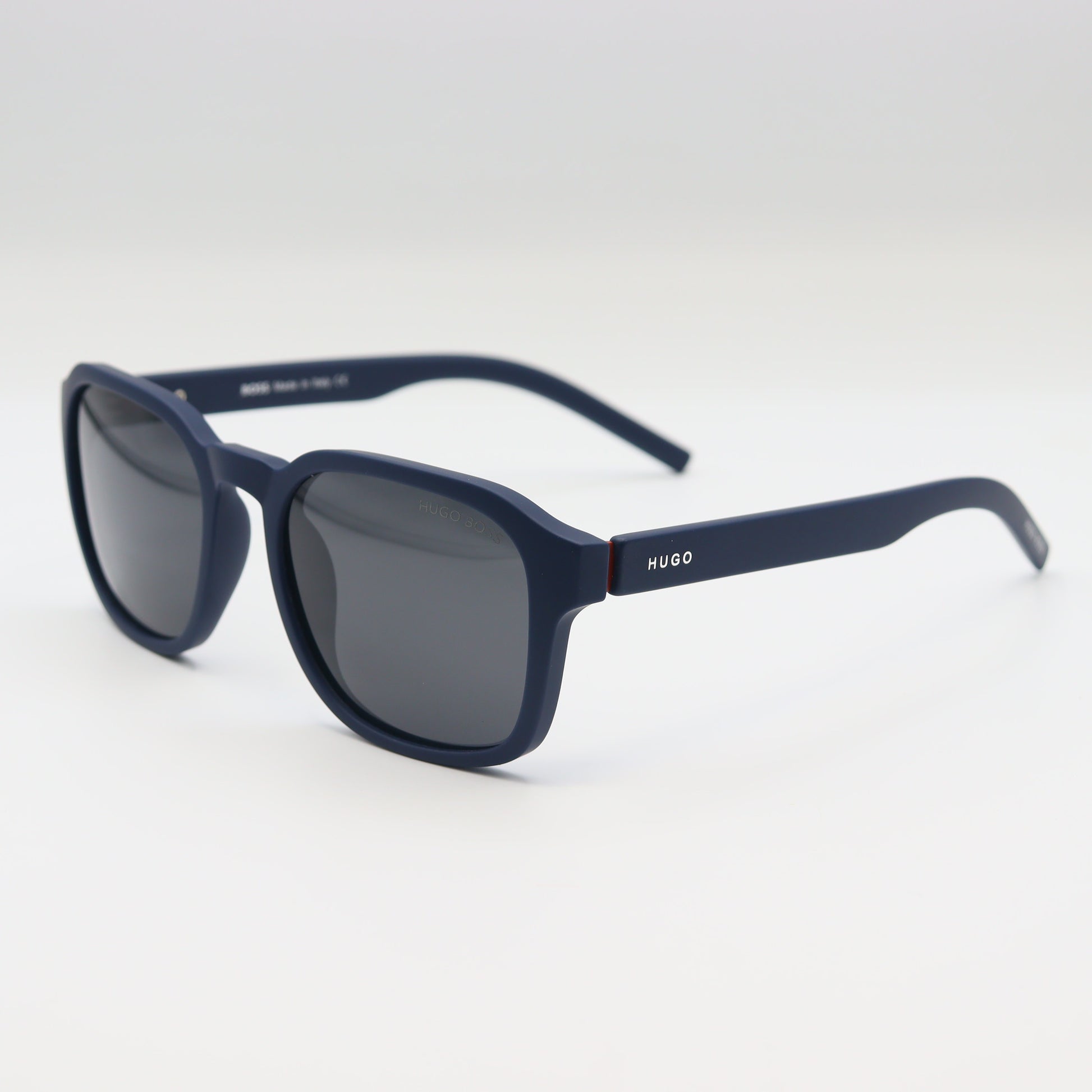HUGO BOSS square polarized sunglasses with black frames and tinted lenses, designed for stylish sun protection.