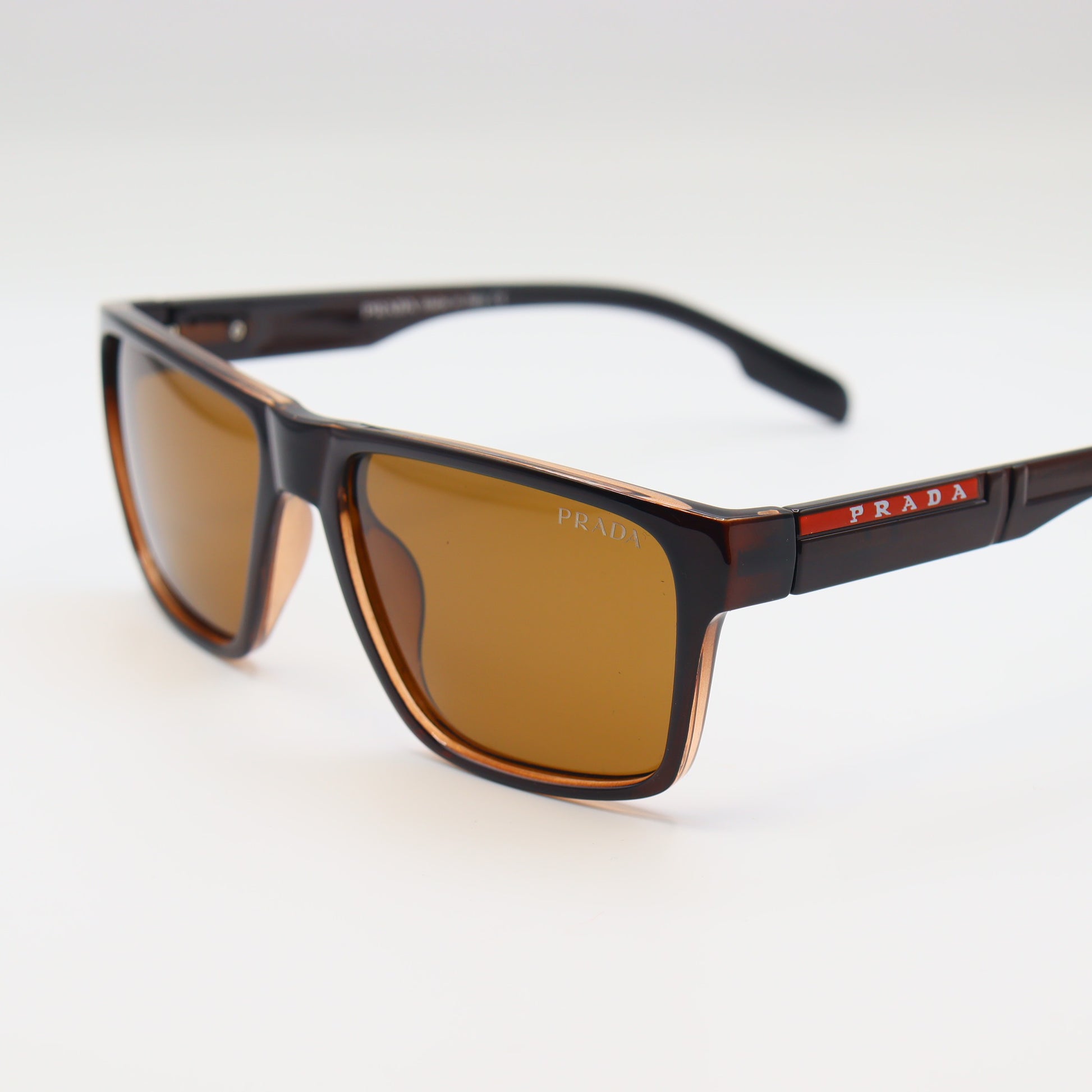 Prada square polarized sunglasses with matte black frame, showcasing sleek design and stylish eyewear from Chashmay Khas.