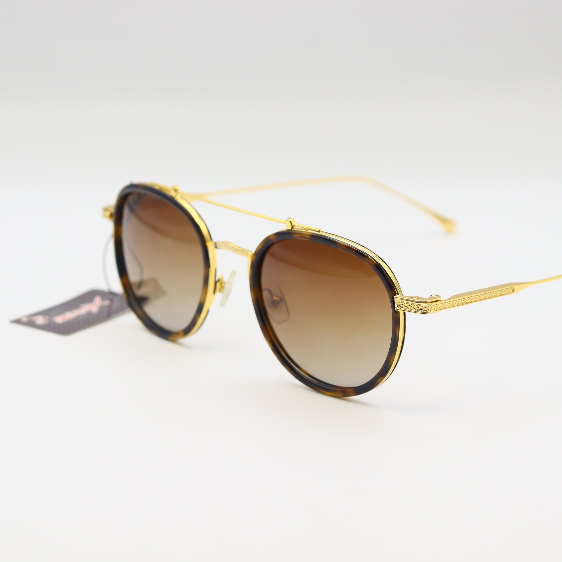 Vintage round sunglasses with tortoise shell frames and gold accents, polarized lenses by CHASHMAY KHAS®