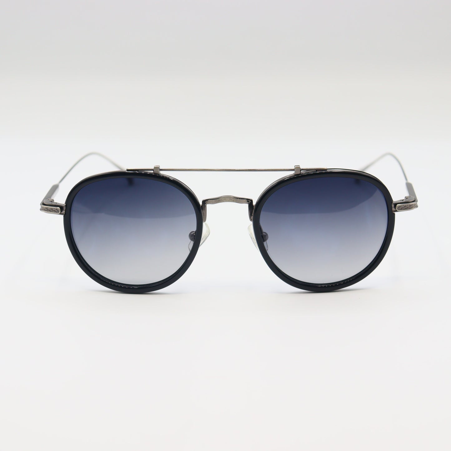 Vintage round sunglasses by CHASHMAY KHAS with tortoise shell frames, gold accents, and polarized lenses.