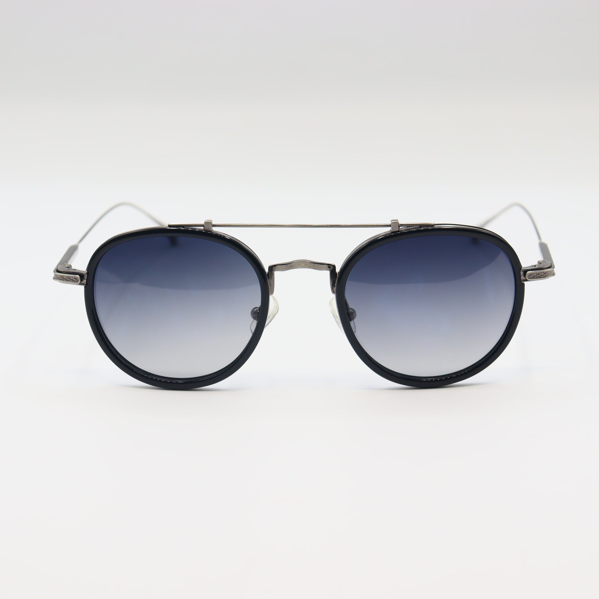 Vintage round sunglasses by CHASHMAY KHAS with tortoise shell frames, gold accents, and polarized lenses.