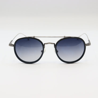 Vintage round sunglasses by CHASHMAY KHAS with tortoise shell frames, gold accents, and polarized lenses.