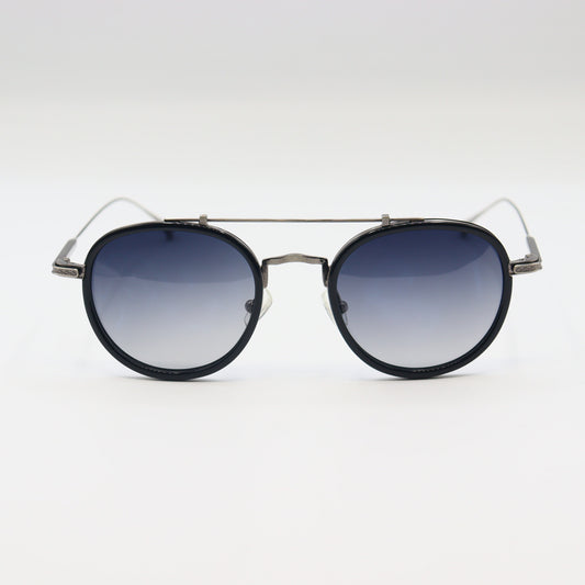 Vintage round sunglasses by CHASHMAY KHAS with tortoise shell frames, gold accents, and polarized lenses.