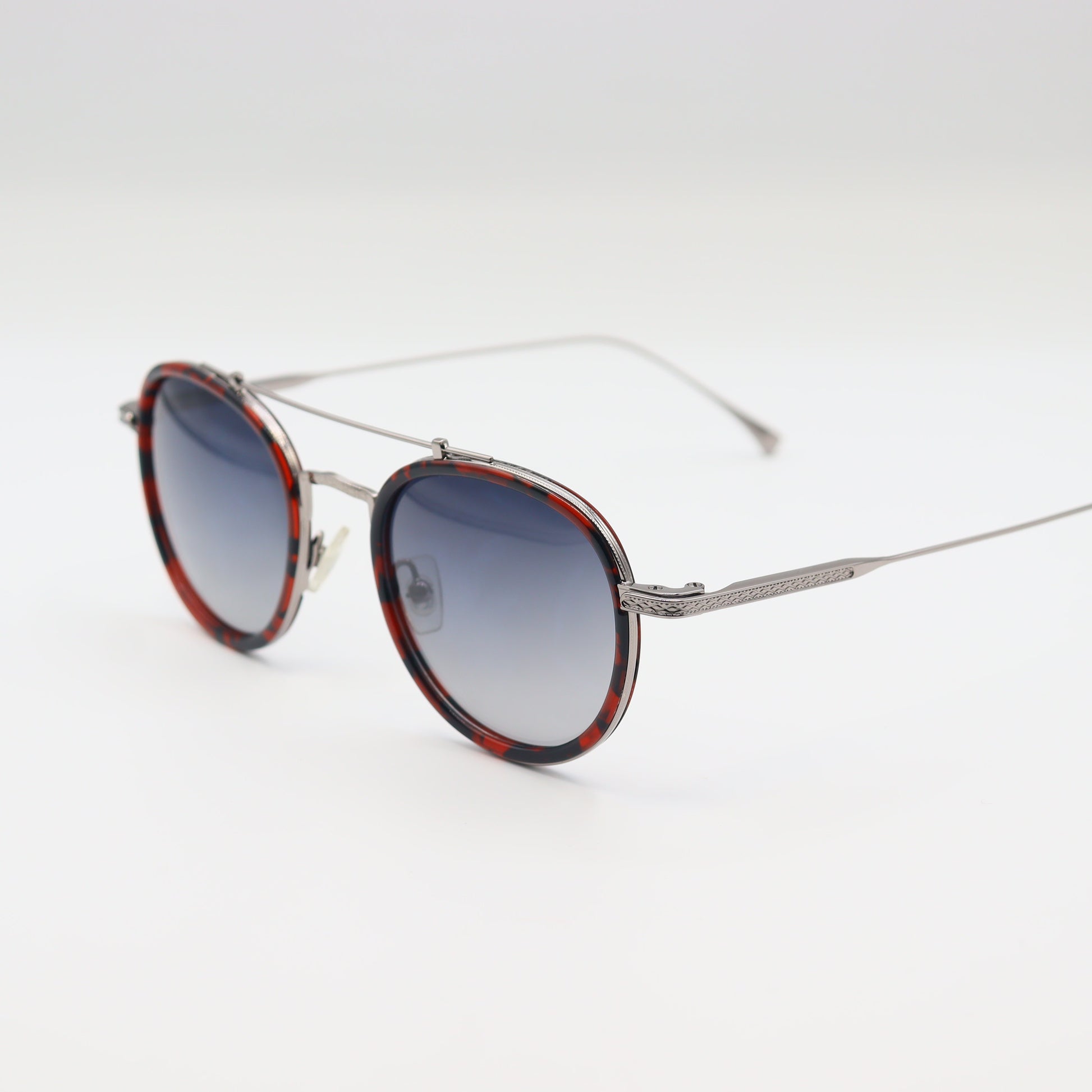Vintage round sunglasses by CHASHMAY KHAS® with tortoise shell frames and gold accents, featuring polarized lenses.