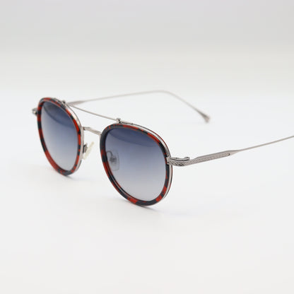 Vintage round sunglasses by CHASHMAY KHAS® with tortoise shell frames and gold accents, featuring polarized lenses.
