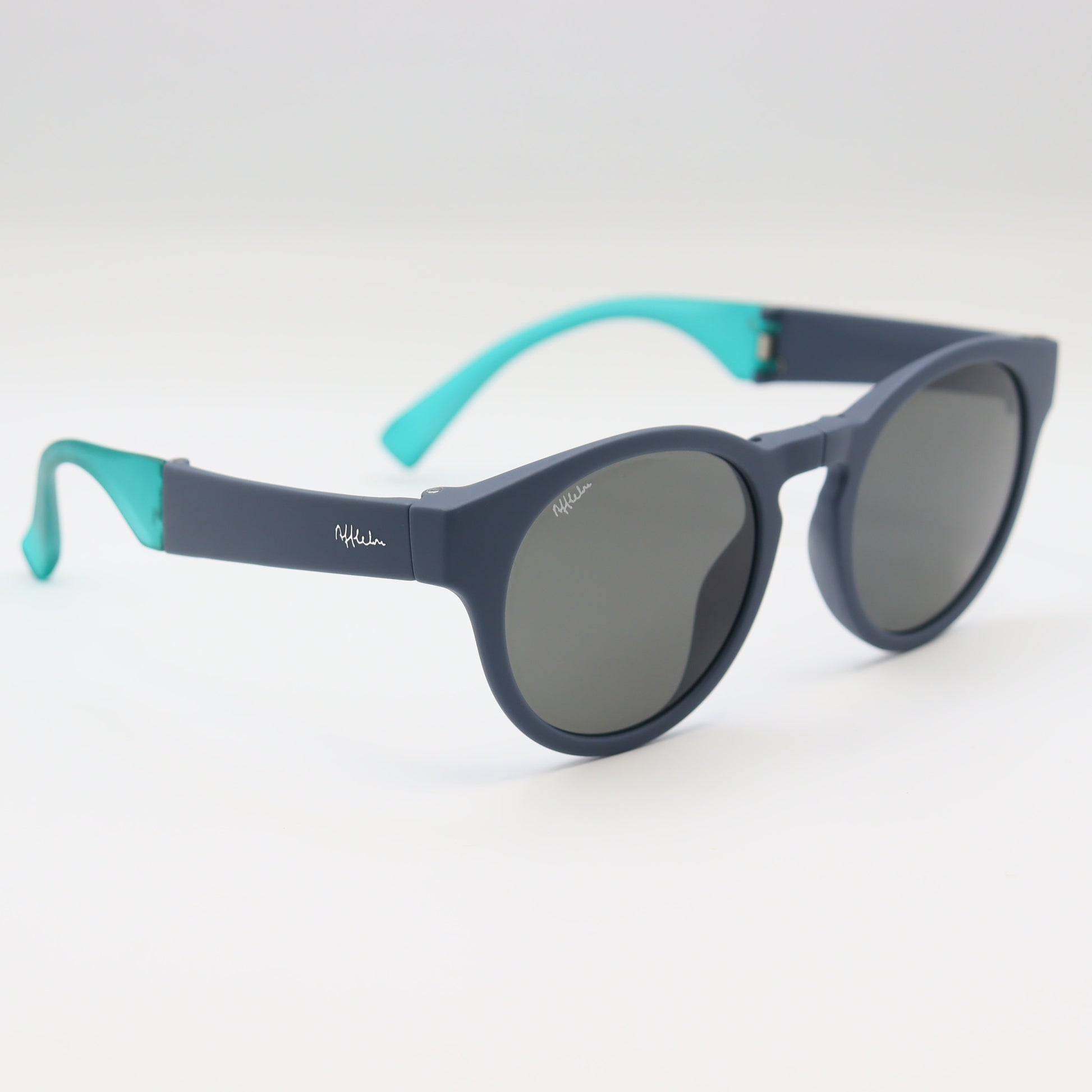 Off-White blue round sunglasses with matte navy and turquoise frames, stylish and trendy eyewear by CHASHMAY KHAS®.
