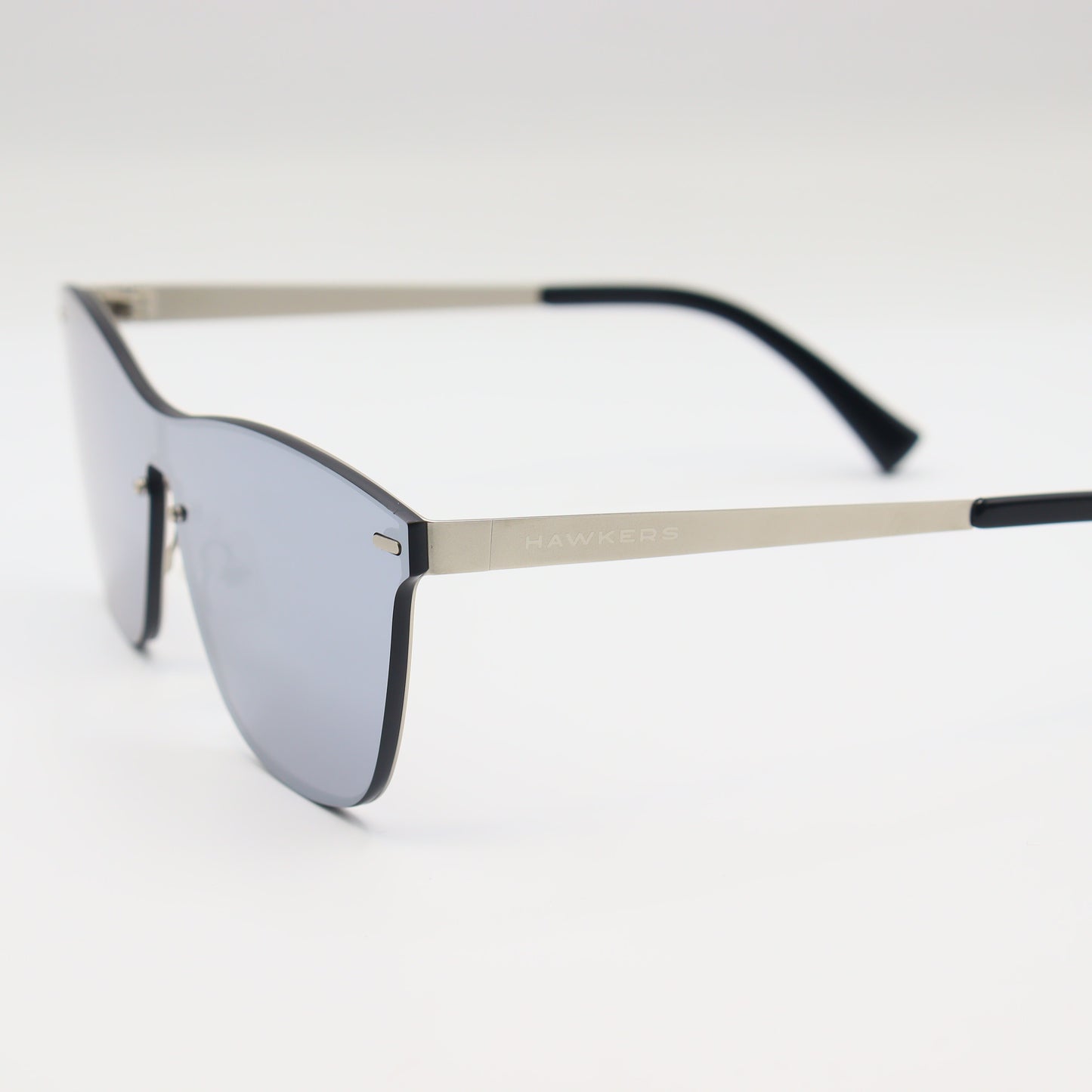 Silver and black aviator-style CHASHMAY KHAS® sunglasses with shield lenses, modern design, shown on a white background.